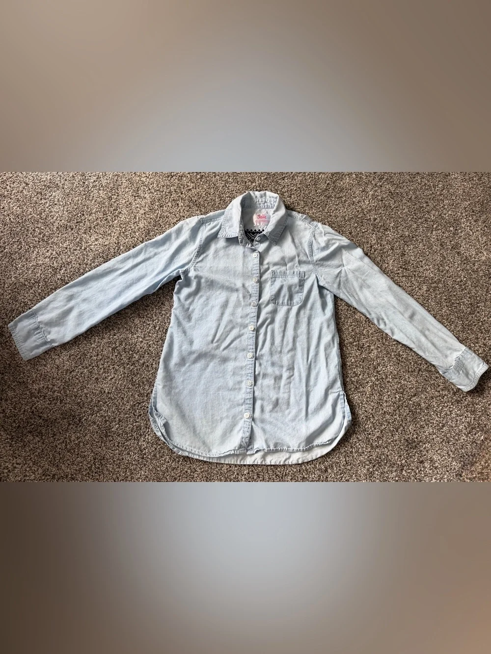 Justice light blue button-up shirt w navy geometric tribal pattern on the back